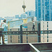 Construction workers not wearing fall protection equipment, by National Institute for Occupational Safety and Health. Construction workers at a considerable height without approrpriate fall protection equipment.