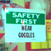 Safety signage by National Institute for Occupational Safety and Health, which reads Safety First, Wear Goggles.